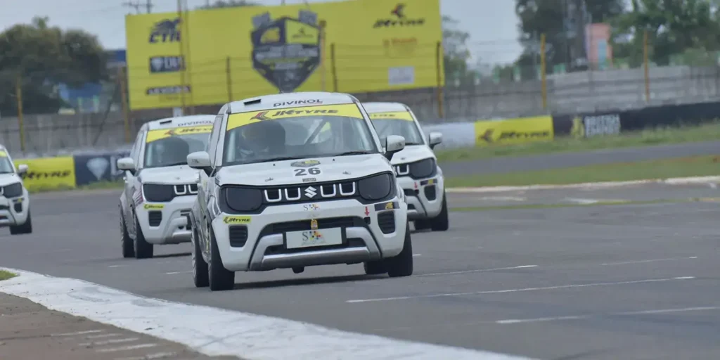 Last-corner chaos, a 0.004-second photo finish and a rain-called finale close Round 1 of FMSCI Indian National Car Racing Championship 2026